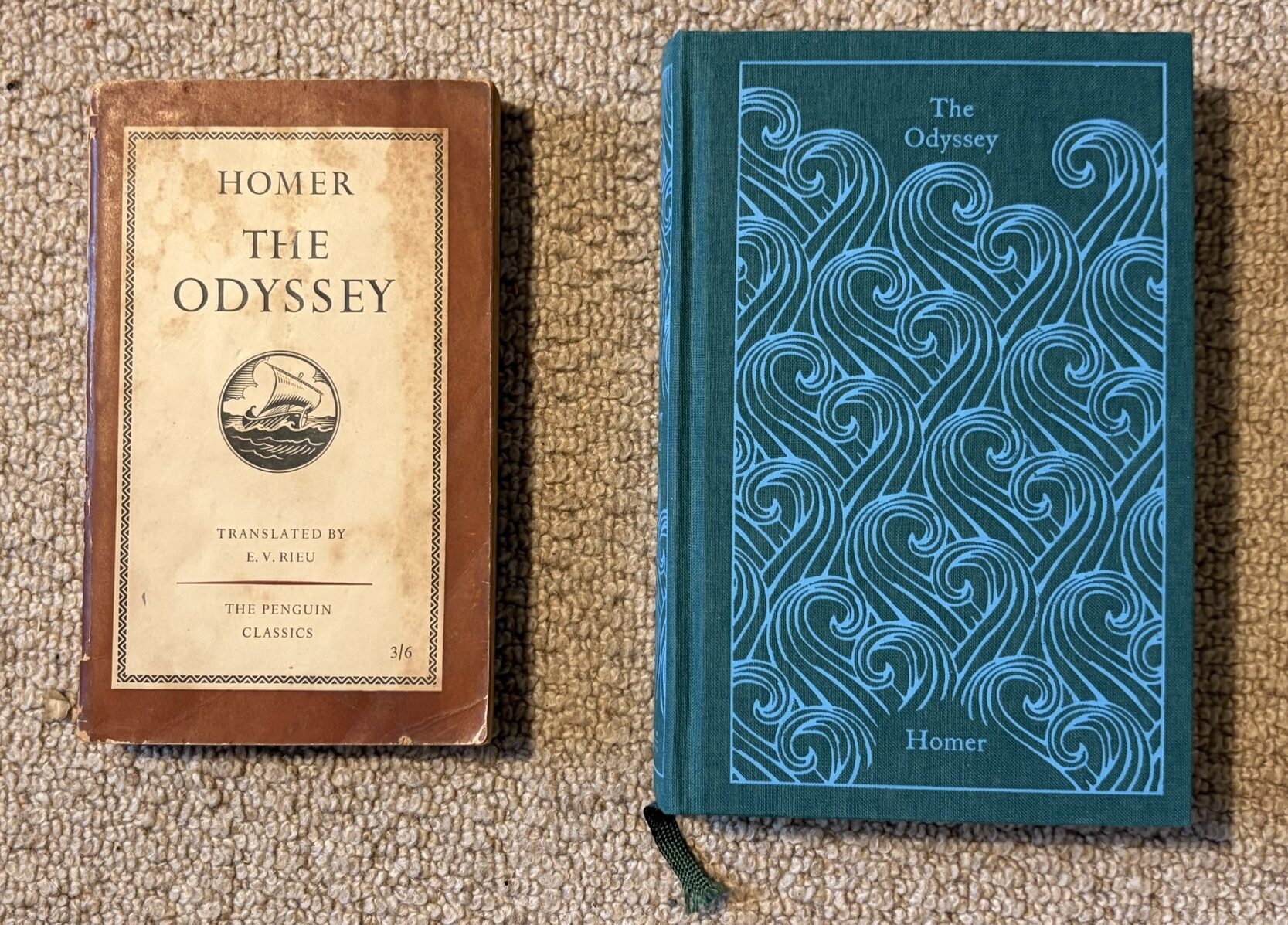 Two copies on Homer's The Odyssey side by side - one old one new.